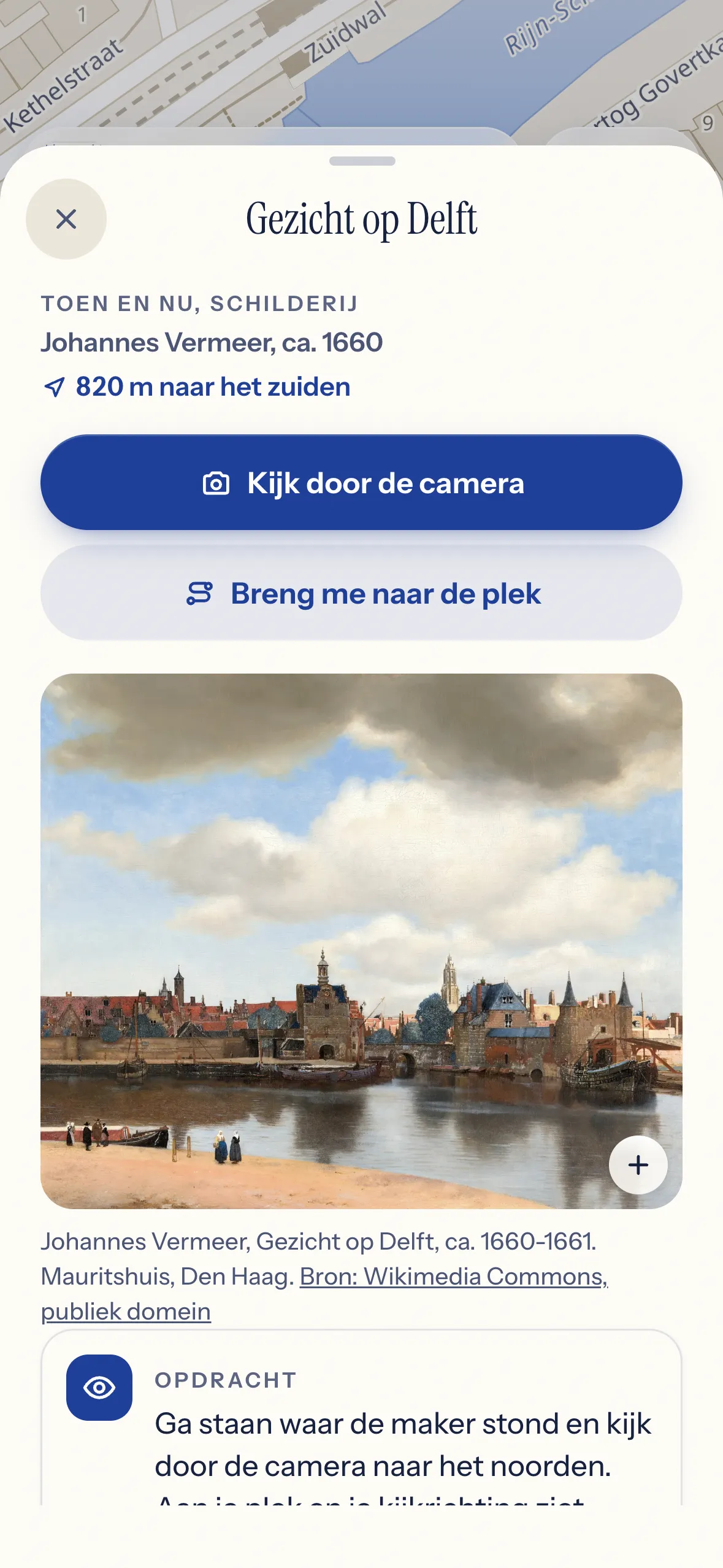 Het blad van Gezicht op Delft in de app, met het schilderij en wat er sindsdien veranderde.